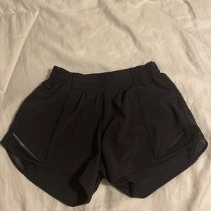 Black 4 inch Lululemon hottie-hot low rise shorts